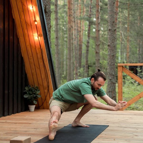 Man stretching outdoors feeling flexible and refreshed.